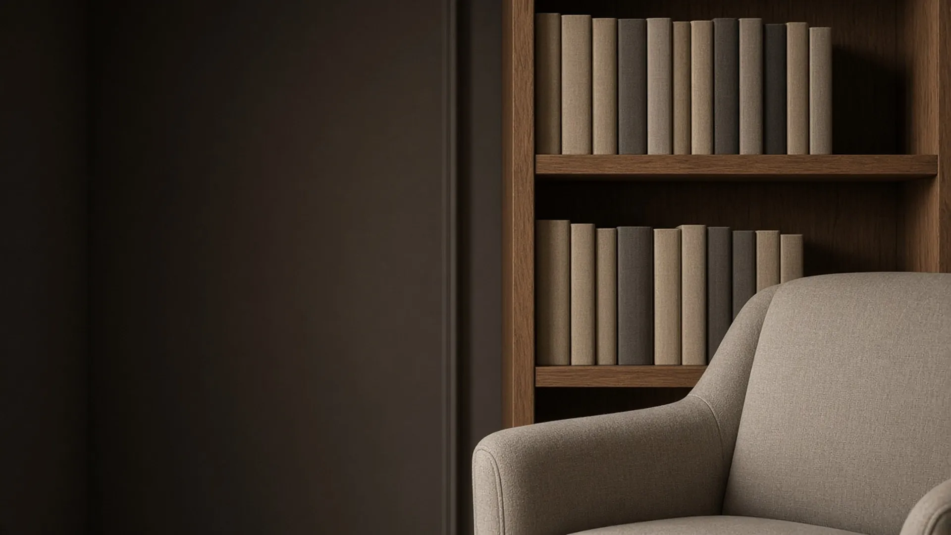 A shelf of plain books in a reading nook